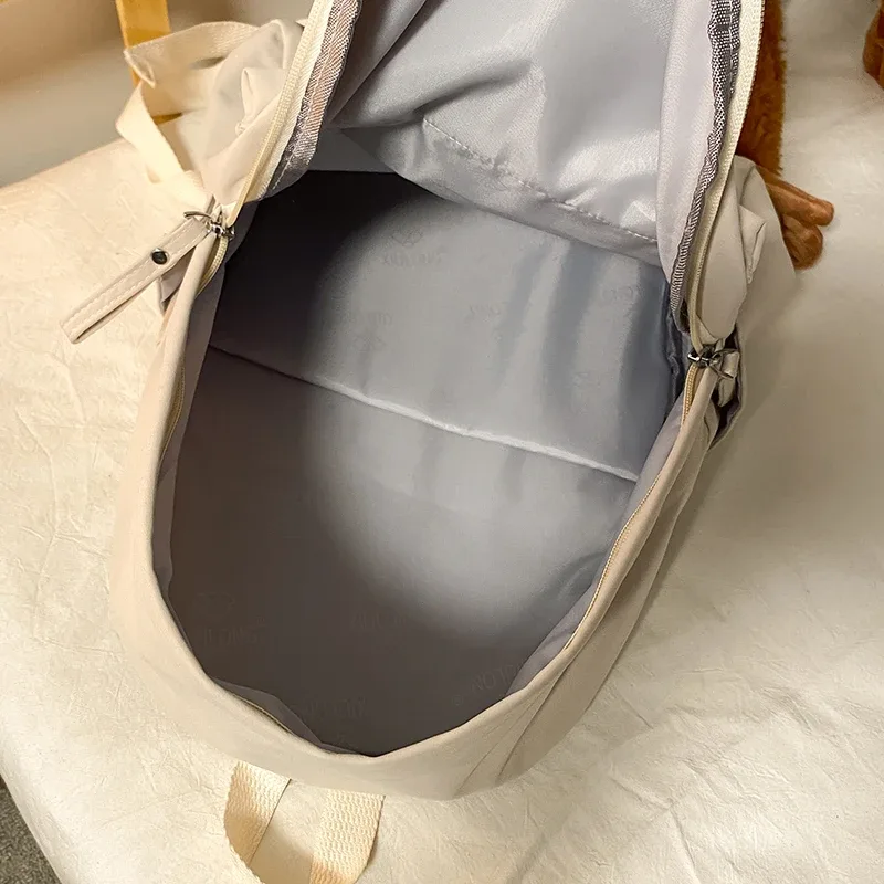 sac à dos simple de couleur unie pour femmes 2022 sacs d'école en nylon imperméable pour adolescentes sac à dos de voyage pour dames sac à bandoulière