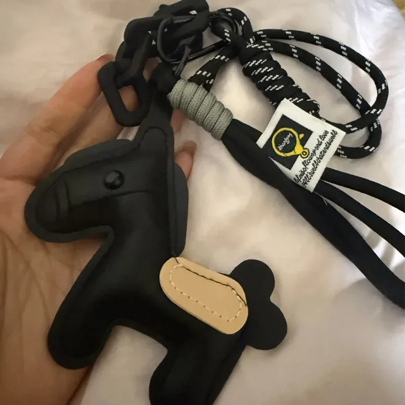 porte-clés en corde tressée avec pendentif en cuir motif cheval, accessoire de mode pour sacs à main, sacs à dos et décoration de clés de voiture