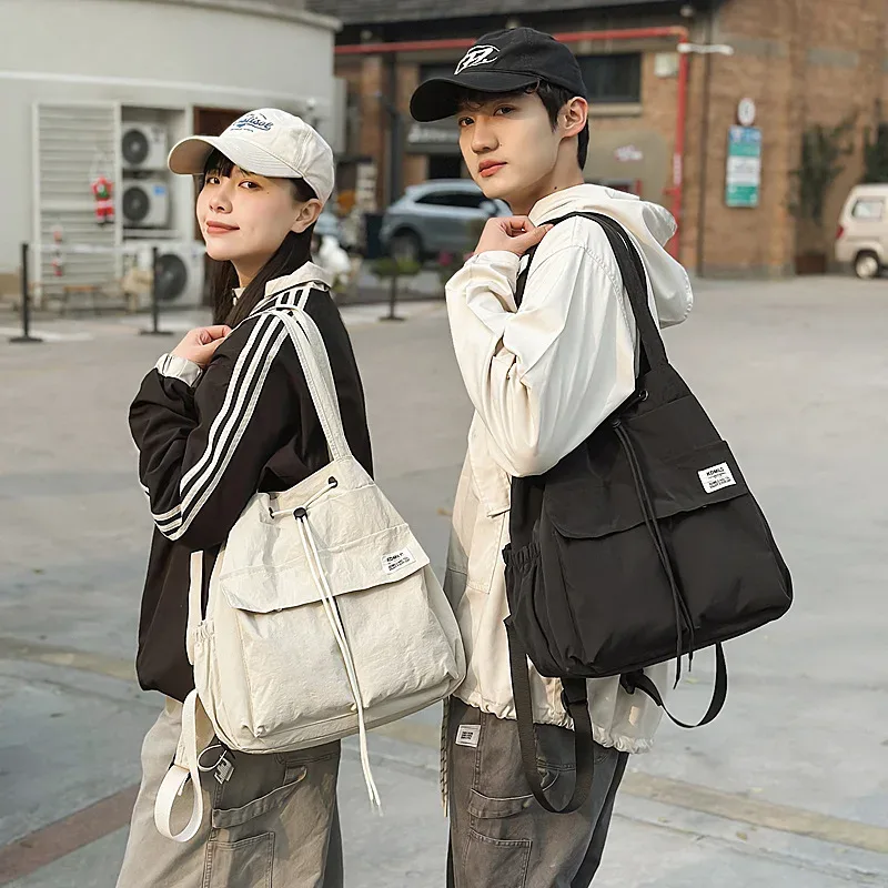 sac à dos léger et décontracté pour femme, idéal pour les voyages, les loisirs en plein air, en nylon, capacité 20-35l, avec compartiment pour ordinateur portable 14 pouces