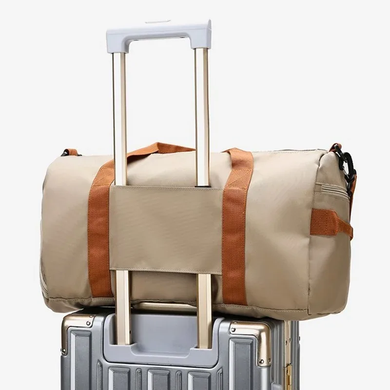 sac voyage polochon oxford khaki beige marron bandoulière poignées compartiments chaussures vêtements humides secs résistant eau transport