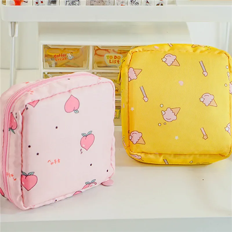 trousse toilette nylon imprimés animaux bleu rose noir blanc pastel voyage maquillage cosmétiques organiseur écouteurs monnaie