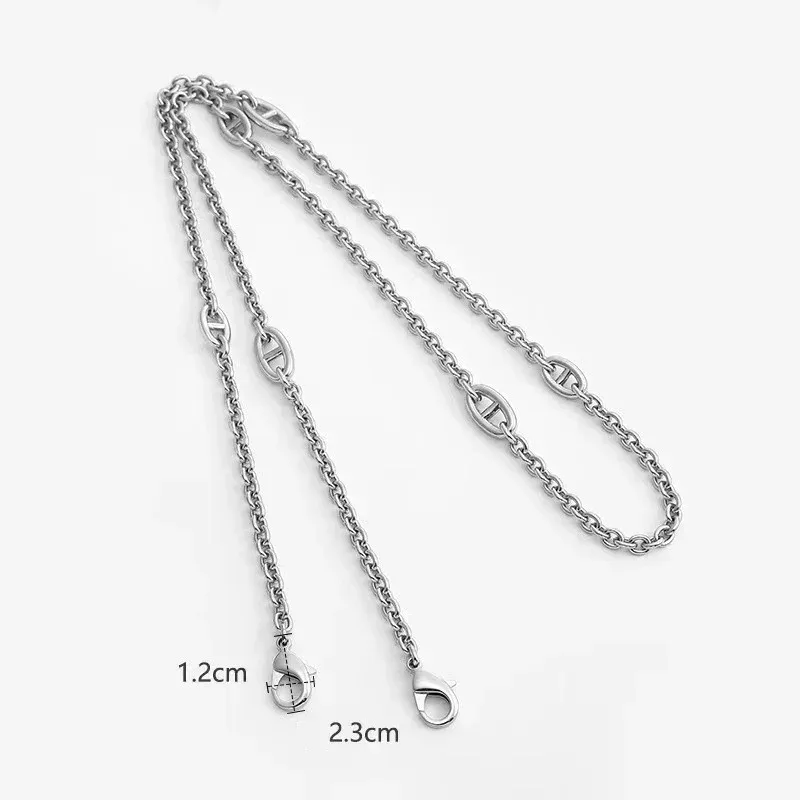 chaîne sangle sac métal or argent marron motifs simples voyage mode accessoires bandoulière épaule transport