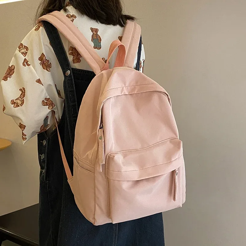 sac à dos simple de couleur unie pour femmes 2022 sacs d'école en nylon imperméable pour adolescentes sac à dos de voyage pour dames sac à bandoulière