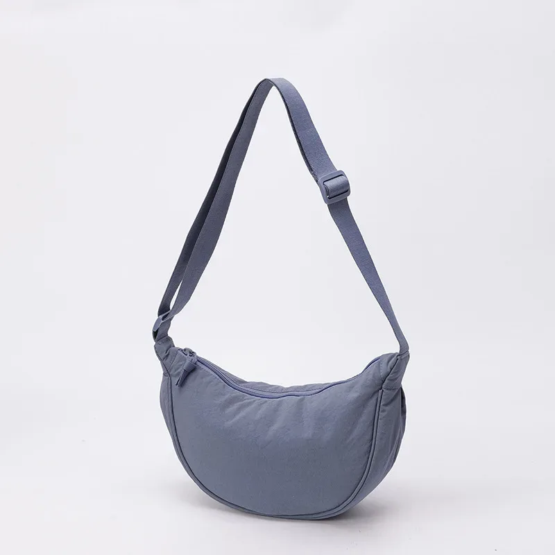 sac bandoulière polyvalent en nylon léger, durable et élégant, disponible en plus de 20 couleurs vibrantes pour un usage quotidien, les voyages et les sorties.
