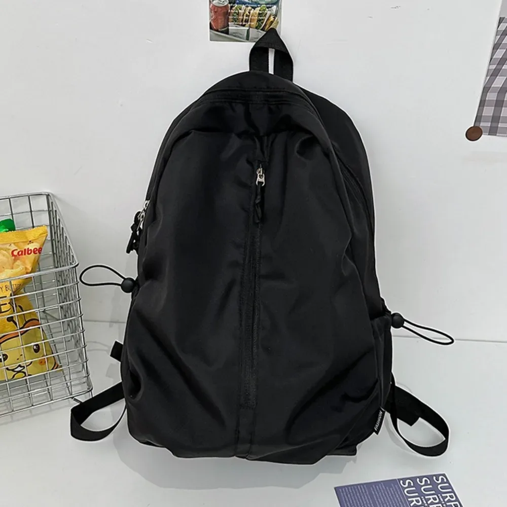 nouveau sac à dos simple de grande capacité, léger et étanche, sac à dos de randonnée avec fermeture éclair, couleur unie, sac d'université pour l'extérieur