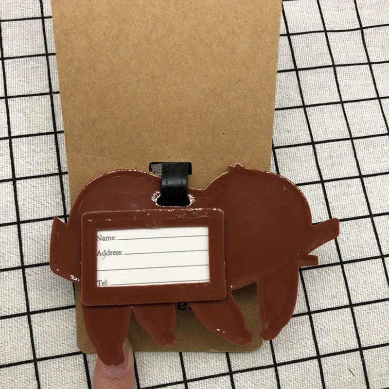 étiquette bagage plastique mignon chien corgi orange blanches roses carton brun anneau noir voyage identification