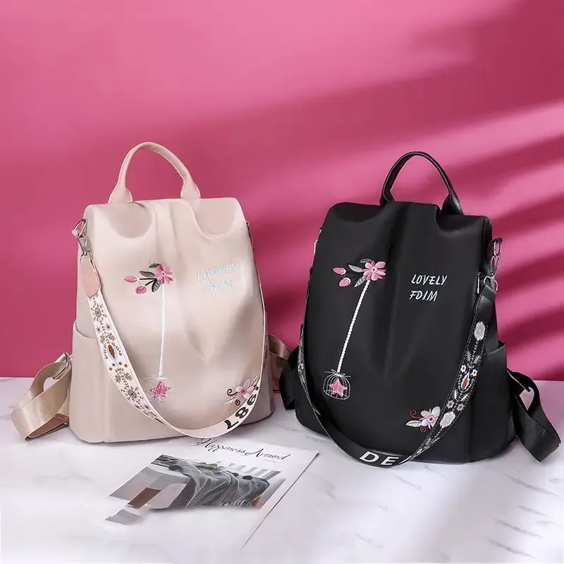 sac à dos oxford imperméable pour femmes, sac d'école antivol à la mode, sac à main de voyage de grande capacité avec broderie de styliste