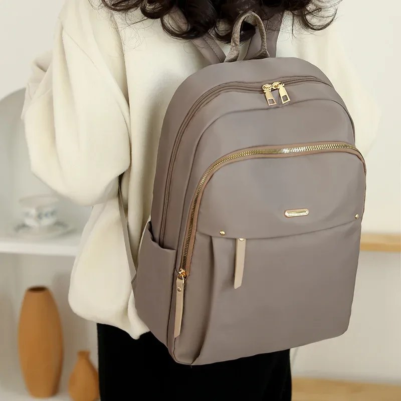 sac à dos en nylon imperméable pour femmes, sac à dos d'école léger, sac à dos de voyage multi-poches, sac à dos élégant de loisirs avec fermeture éclair
