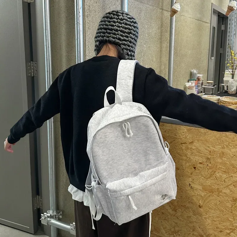sac à dos noir minimaliste pour femmes, sac d'école décontracté avec broderie florale pour étudiants, utilisation quotidienne, voyage