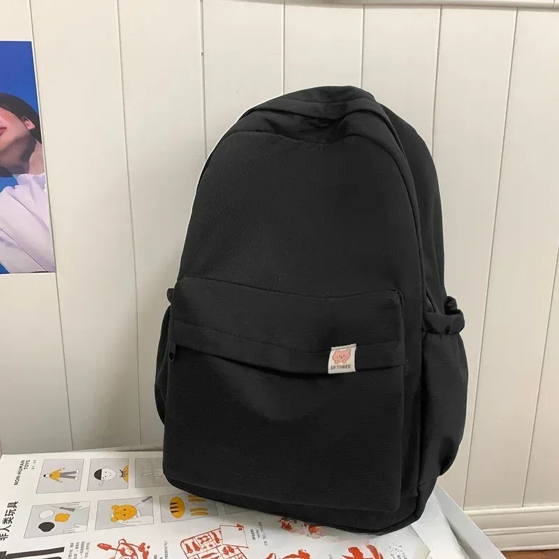 nouveau sac à dos imperméable en nylon pour femmes sac de voyage pour femmes sacs à dos cartable pour adolescentes couleur unie bookbag mochila bookbag