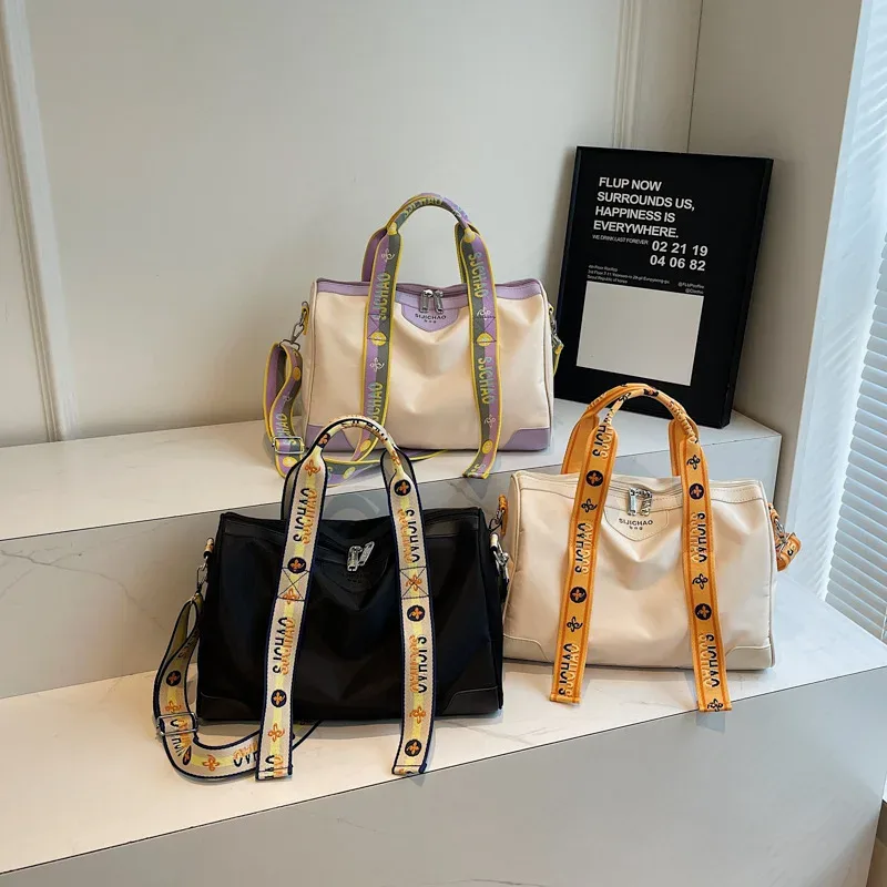sac voyage nylon blanc violet gris bandoulière poignée supérieure motifs lettres s u voyage business capacité 20 35l