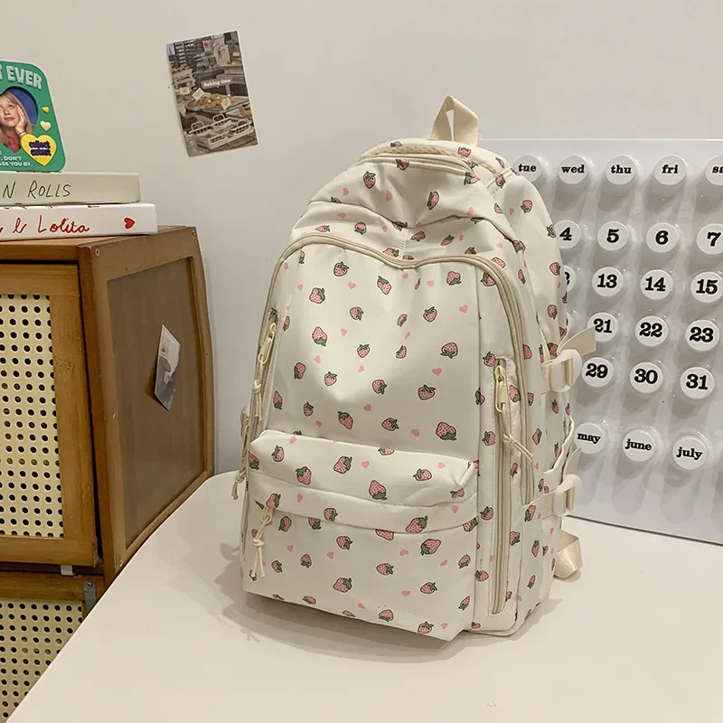 sac à dos décontracté à imprimé floral grande capacité pour filles, sac d'école en nylon imperméable, capacité pour ordinateur portable 14 pouces, style frais et doux