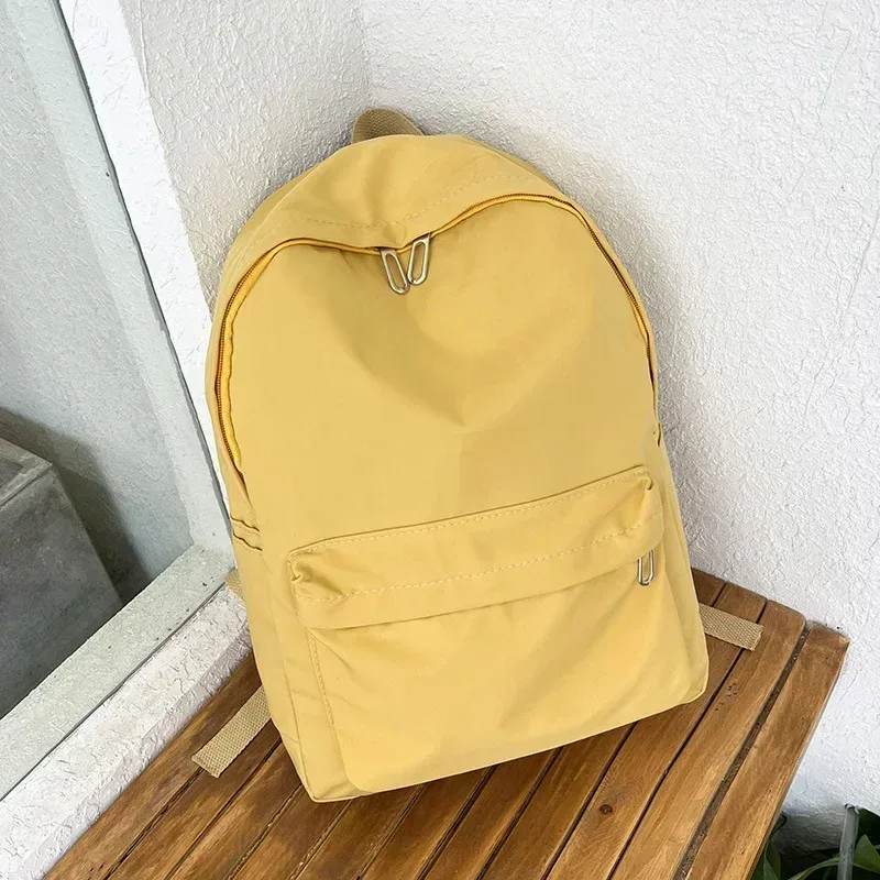 haute qualité nouveau imperméable à l'eau en nylon femmes sac à dos femme sac de voyage sacs à dos cartable pour adolescentes couleur unie bookbag