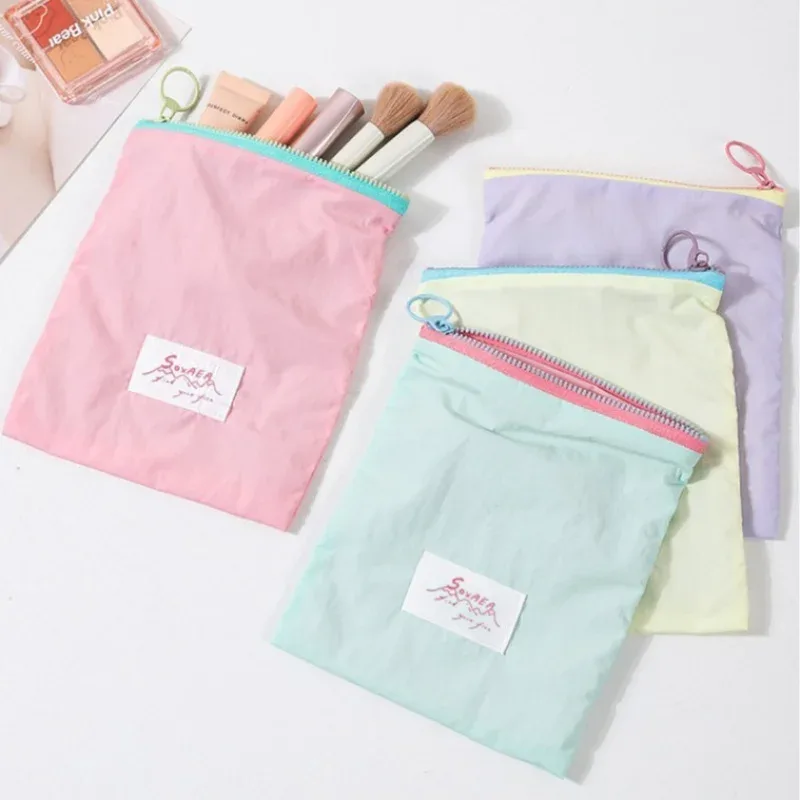 pochette voyage polyester imperméable rose jaune clair violet cosmétiques maquillage câbles documents multifonction sac rangement