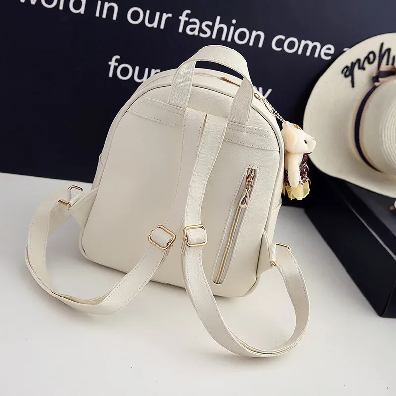 sac dos cuir synthétique gris motif géométrique relief bandoulière amovible porte-monnaie inclus voyage femme