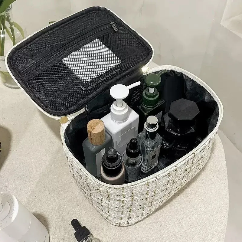 trousse toilette tweed luxe blanc doré zip double poignée supérieure compartiments multiples voyage femmes