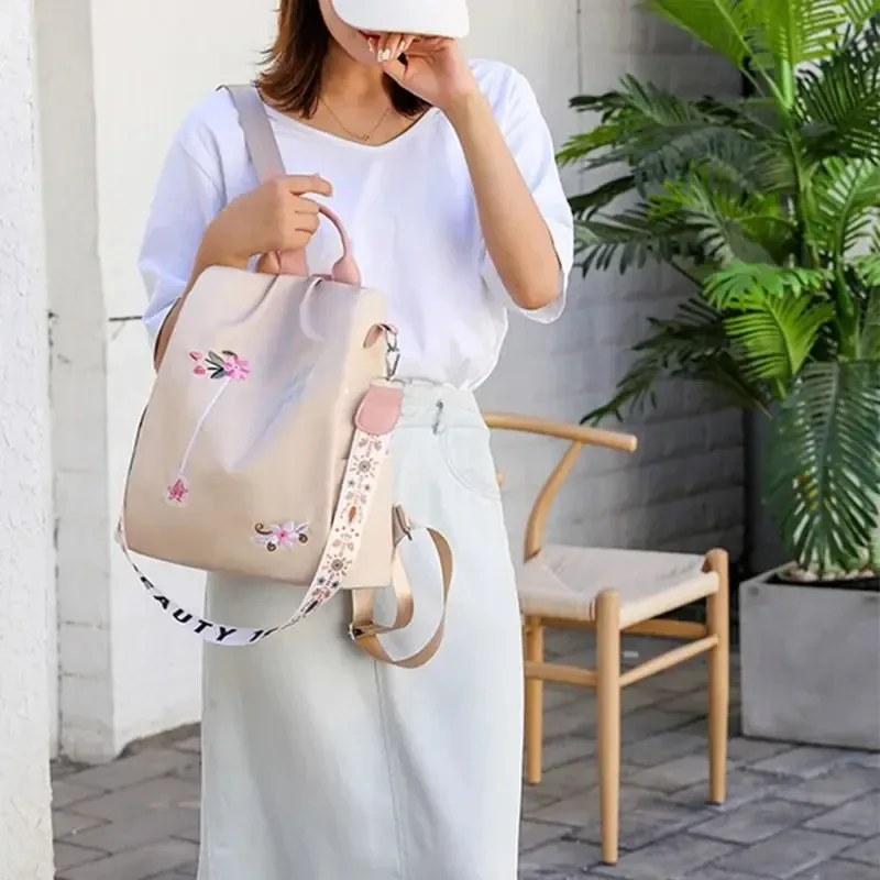 sac à dos oxford imperméable pour femmes, sac d'école antivol à la mode, sac à main de voyage de grande capacité avec broderie de styliste