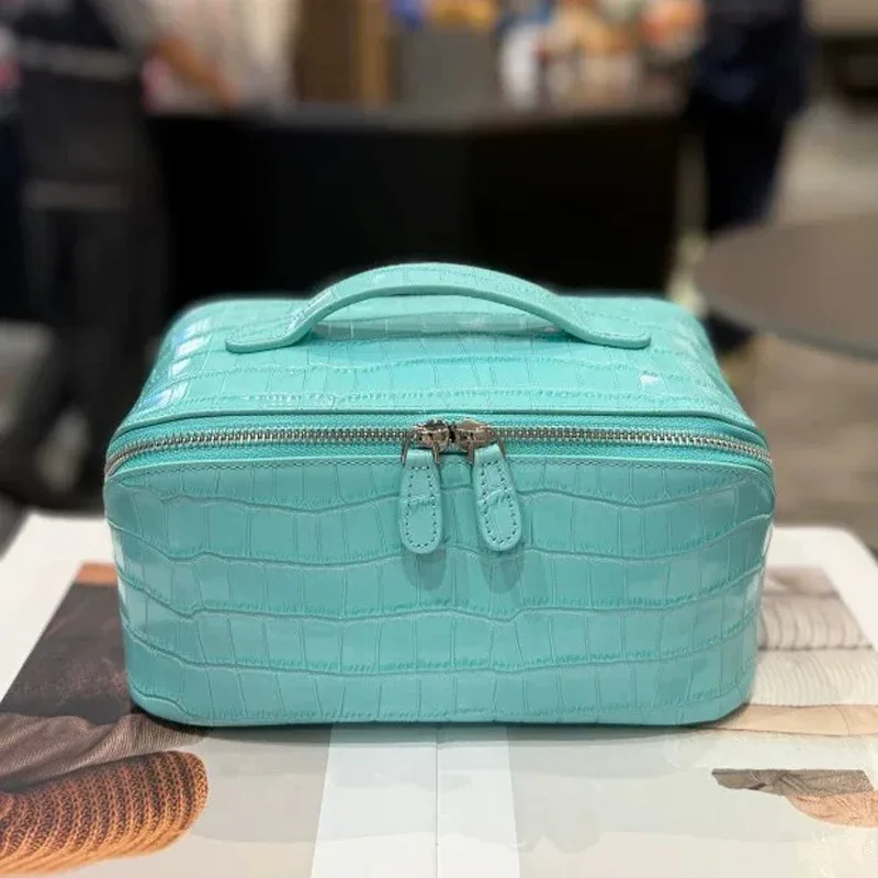 nouvelle trousse de maquillage en cuir véritable, motif crocodile, grande capacité, série de couleurs haut de gamme, sac de toilette portable de voyage
