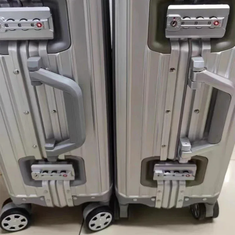 valise aluminium brillant argent robuste protections 360 degres roues silencieuses design professionnel bagage voyage trousse toile grande capacite