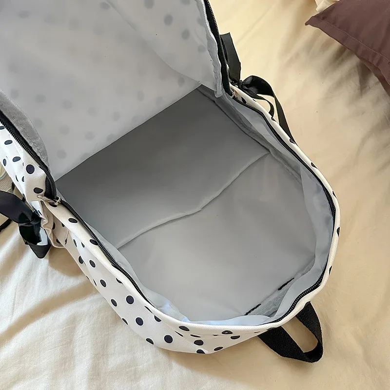 sacs à dos à pois pour femmes, sacs d'école à nœud de grande capacité pour adolescentes, sacs de loisirs ou de voyage en nylon doux, nouveau paquet de livres 2025