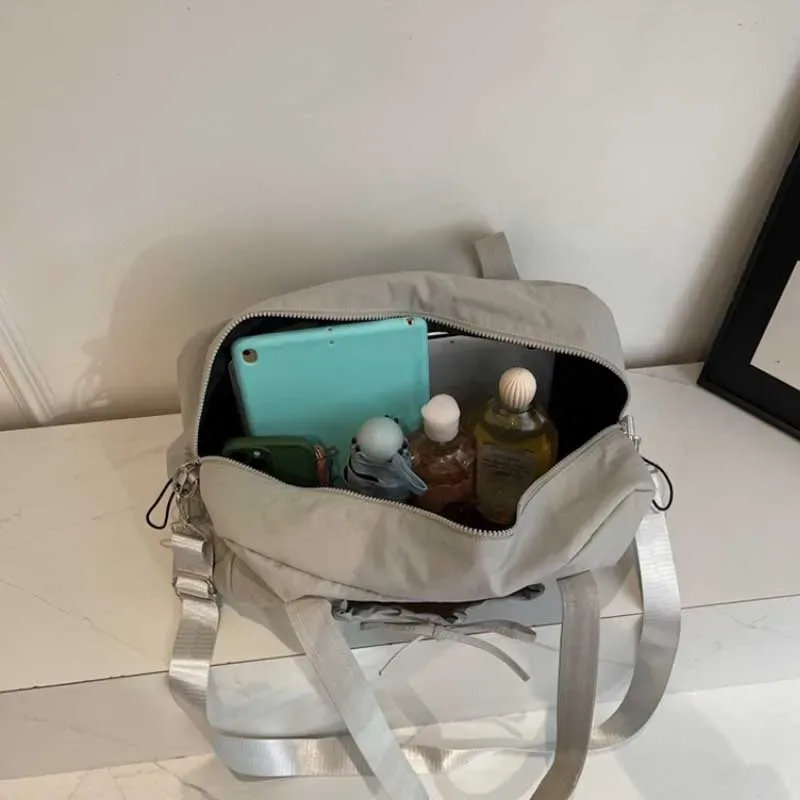 nouveau sac de voyage grande capacité épaule portable sac à bagages sac de rangement de voyage sacs d'embarquement sport fitness sacs pour femmes сумка