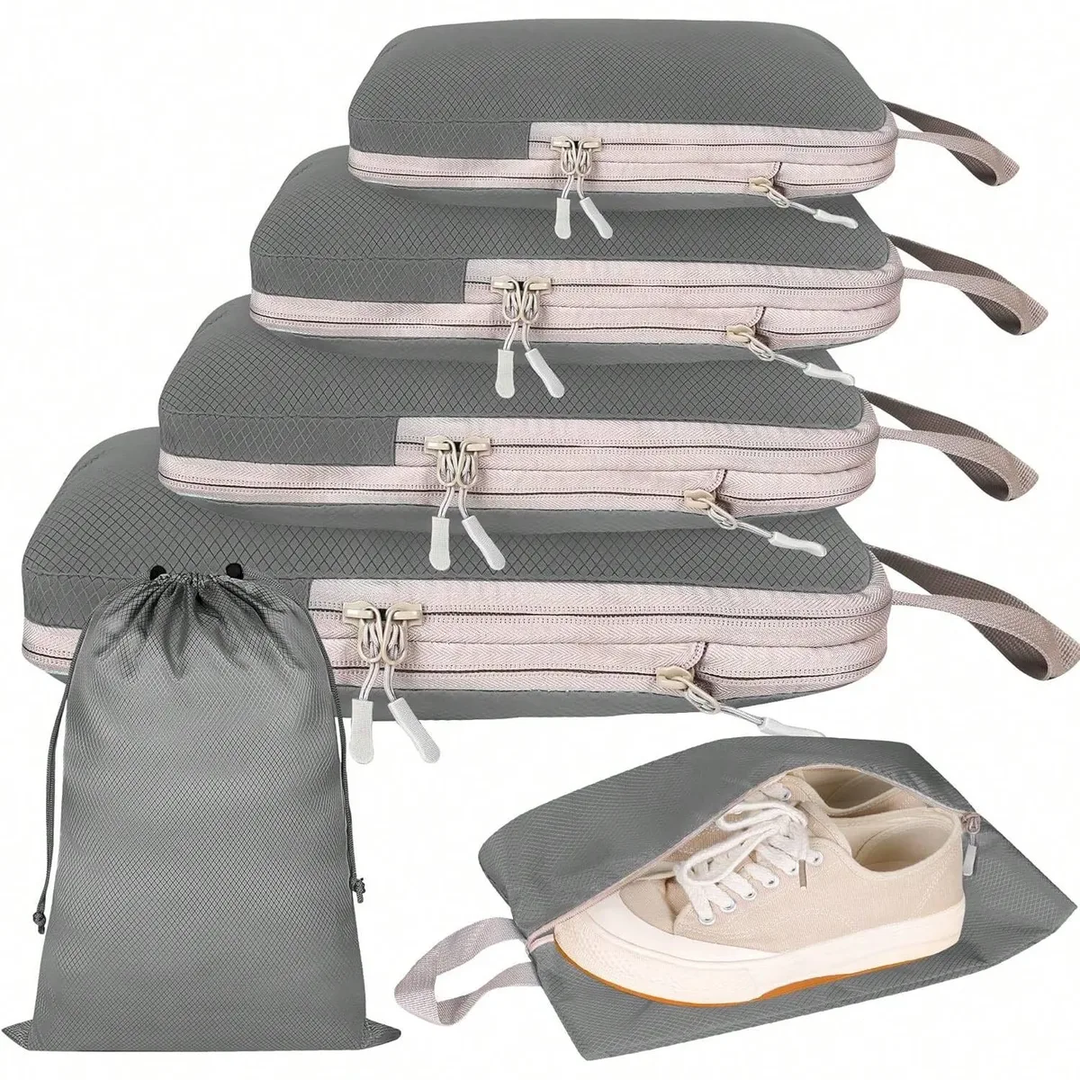 organisateur voyage polyester gris clair poignée noire fermeture glissière compressible sac chaussures rangement cube traçabilité usage polyvalent
