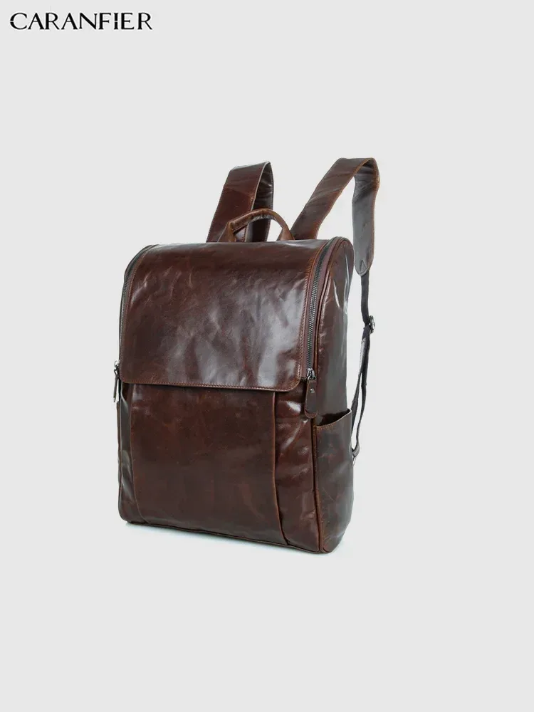 sac dos cuir véritable marron foncé poignées boucles métalliques pochette latérale bandoulière arquée fermeture éclair informatique voyage
