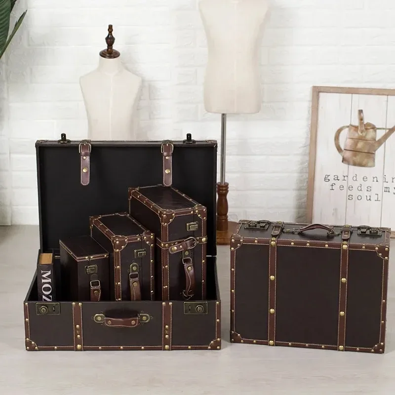 valise cuir pu vert foncé rivets dorés poignées cuir marron intérieur noir voyage décoration