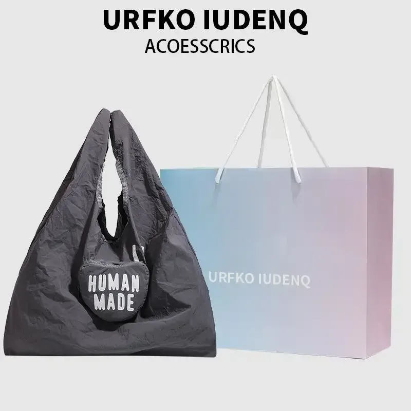 sac de rangement human made 2026 pour hommes et femmes, sac fourre-tout pliable imprimé love, sac de courses portable et imperméable pour usage quotidien