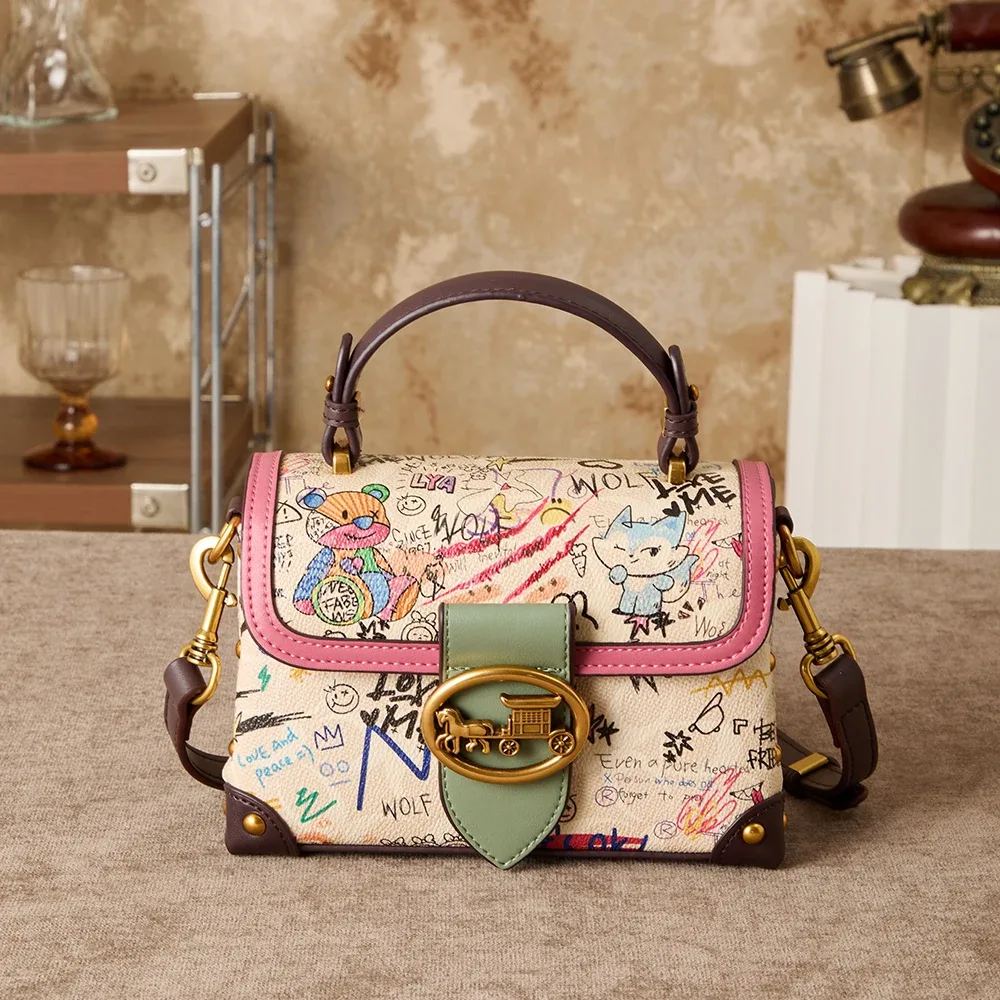sac à main rétro graffiti avancé pour femmes, nouveau design de niche 2026, imprimé polyvalent, sac à bandoulière tendance.