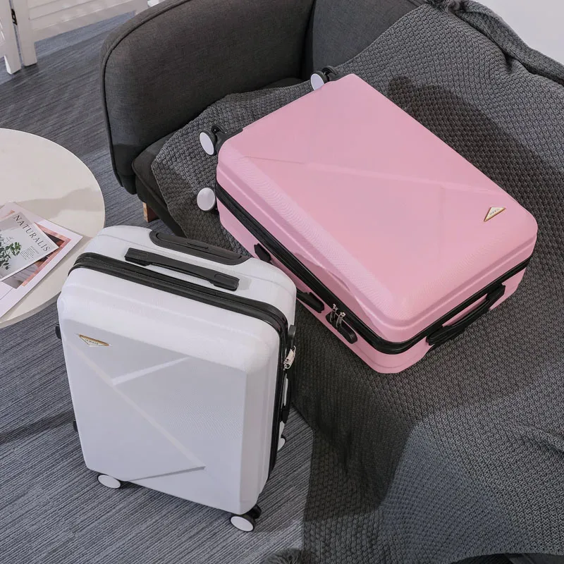 valise abs plastique dur motif géométrique lignes diagonales relief gris rose blanc jaune vert bleu rouge bagage affaires voyage