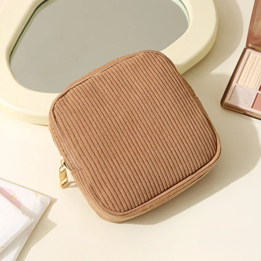 pochette polyester beige rayures verticales cosmétiques serviettes hygiéniques voyage femmes organisateur tranche usage polyvalent
