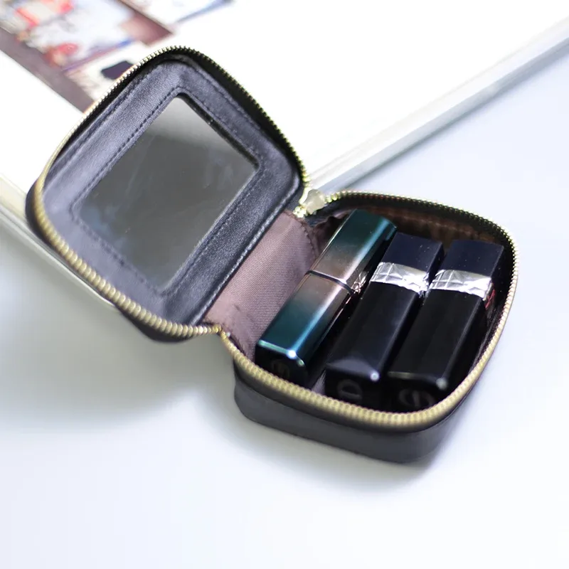organisateur voyage cuir vache motif rayé blanc noir rose bleu carré zip décontracté cosmétiques maquillage
