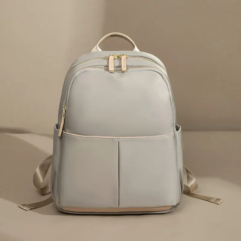 sac dos oxford universtitaire polyester beige bandoulière arquée fermeture éclair anti vol voyage femme journee ecole travail