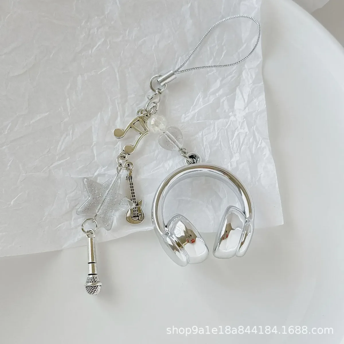 porte clé musical chaine métal accoutrements musicaux petit pendentif créatif voyage sac main pods casque bouton poussoir écouteurs accessoire voyage