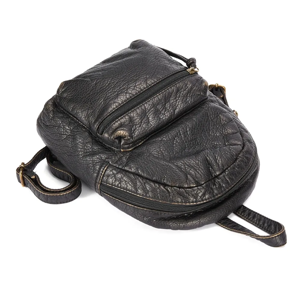 sac dos cuir souple bleu vintage compact poches avant poignet souple fermeture éclair usage quotidien femmes