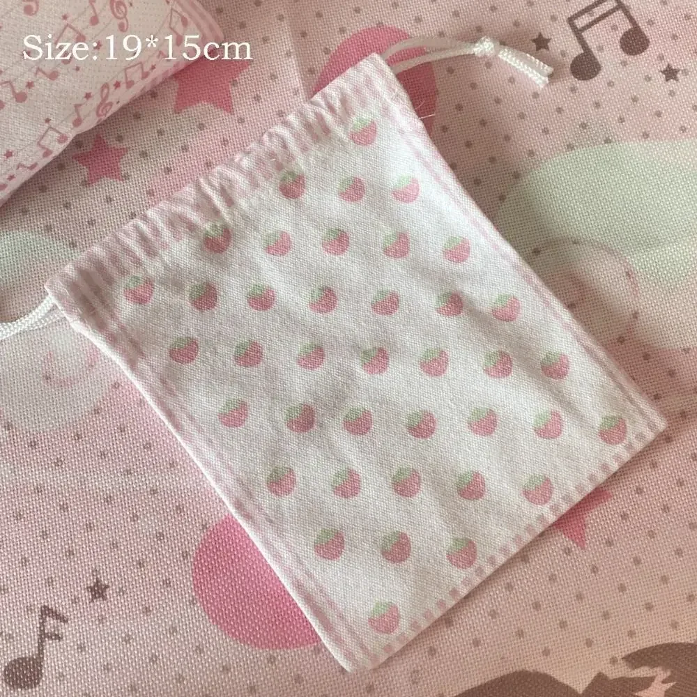 nouvelle pochette à cordon grande capacité motif fraise et note de musique, sac à monnaie portable, pochette de rangement pour maquillage, cadeau, motif dessin animé