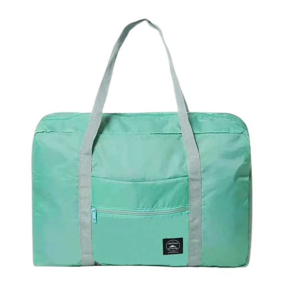 sac de voyage pliable de grande capacité, imperméable et résistant à l'usure, peut être porté à la main et stocké sur une épaule à la maison.