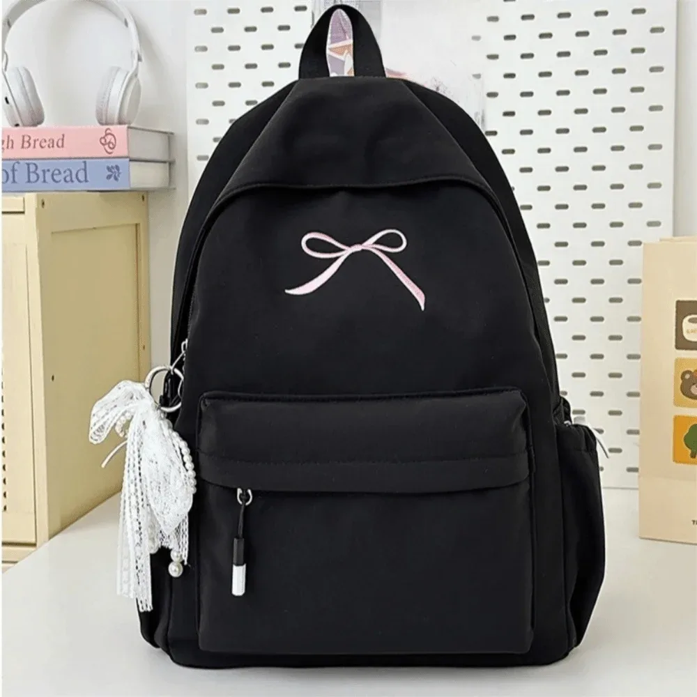 sac à dos portable avec nœud brodé pour filles, cartable en nylon de couleur unie pour étudiants, sac à dos de voyage léger de grande capacité