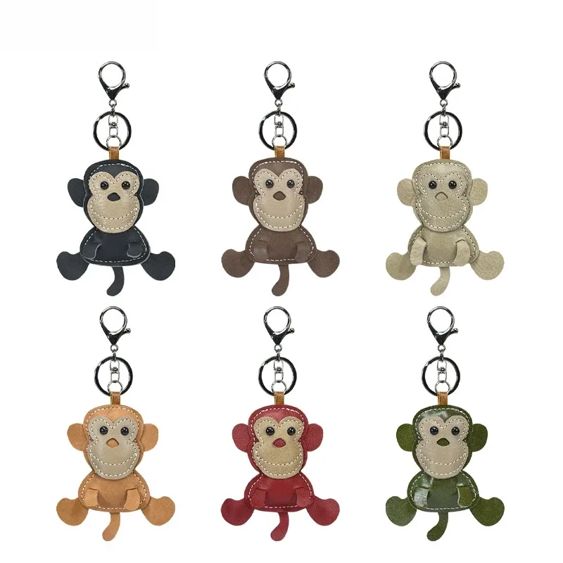 Nouveau mignon singe en cuir de vache porte-clés mini hommes et femmes sac à main pendentif à la mode porte-clés sac à bagages pièces accessoires