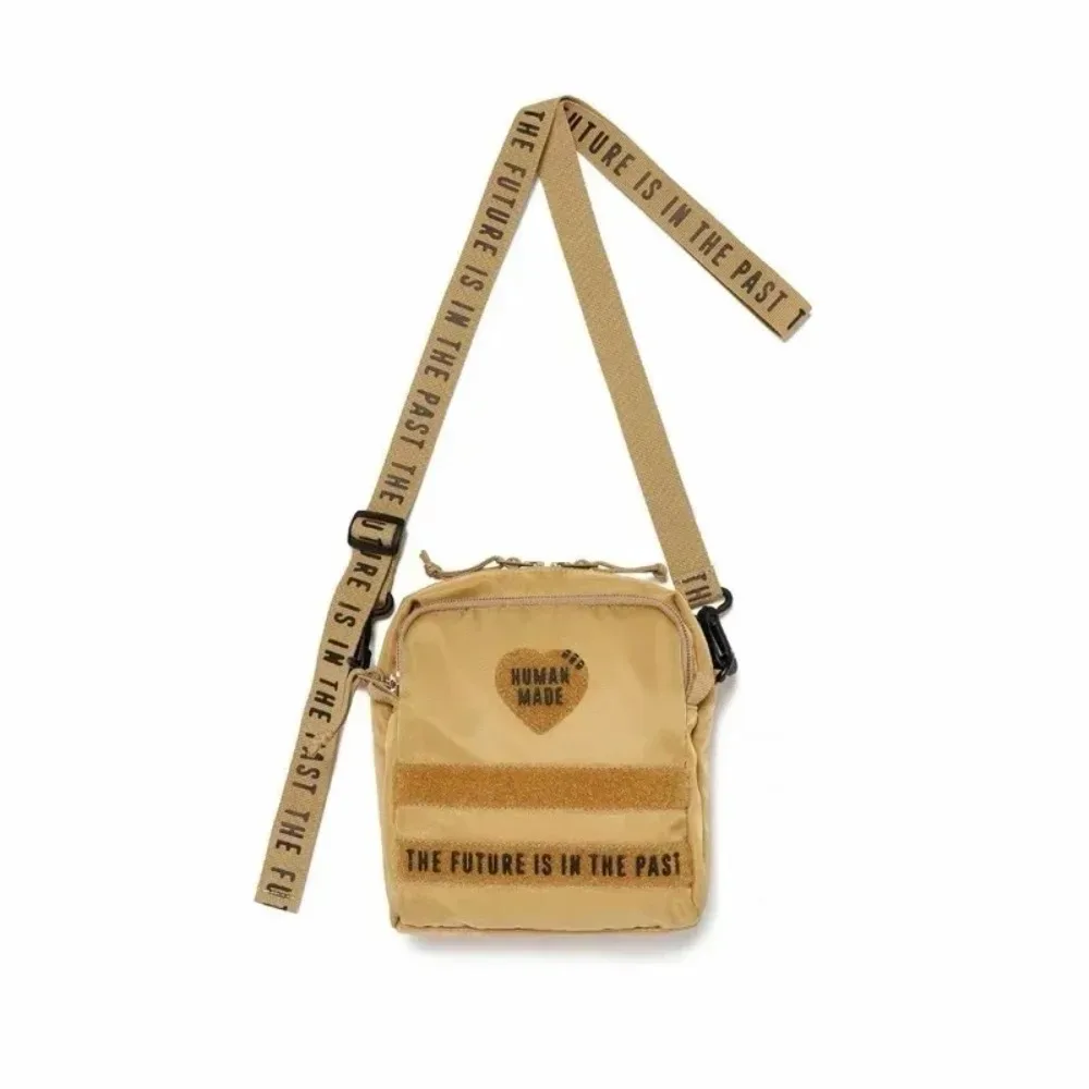 sac à bandoulière unisexe en nylon human made 2026, sac banane tricolore léger et pratique, sac bandoulière décontracté pour les trajets quotidiens