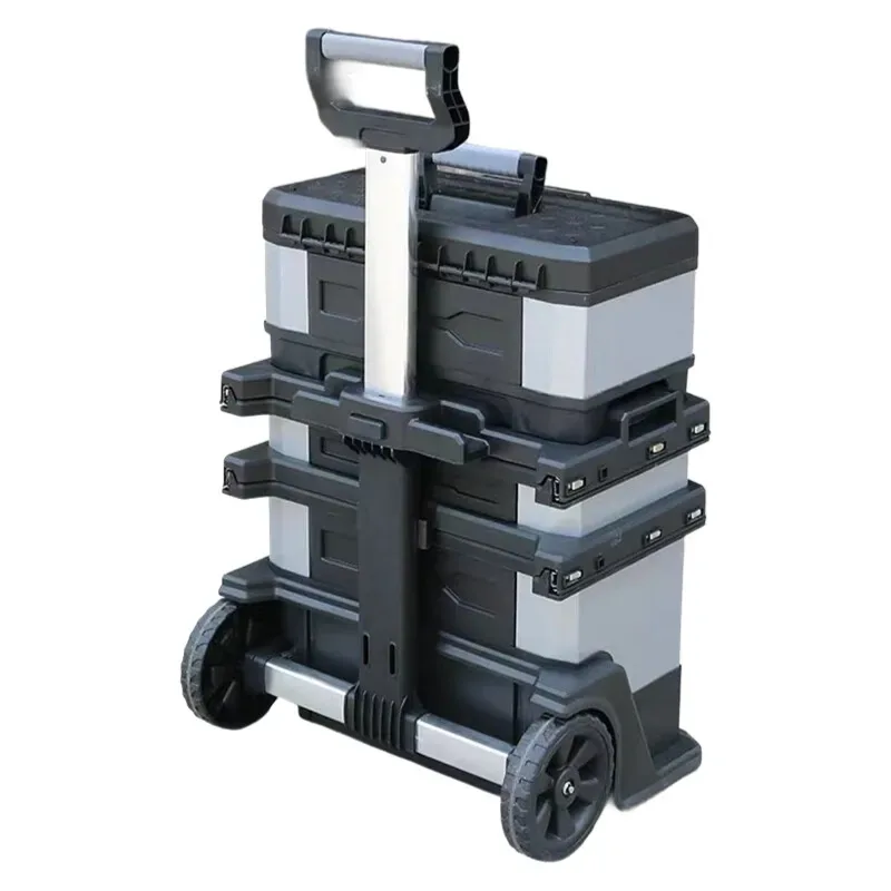 valise aluminium grise roulettes fixes poignées bleues compartiments superposés transport voyage travaux hausse atelier