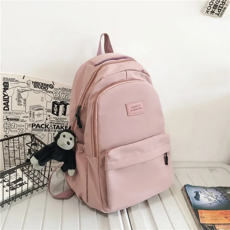 sac à dos femme couleur unie femme multi-poches décontracté homme sac de voyage cartable de haute qualité pour adolescente livre sac à dos