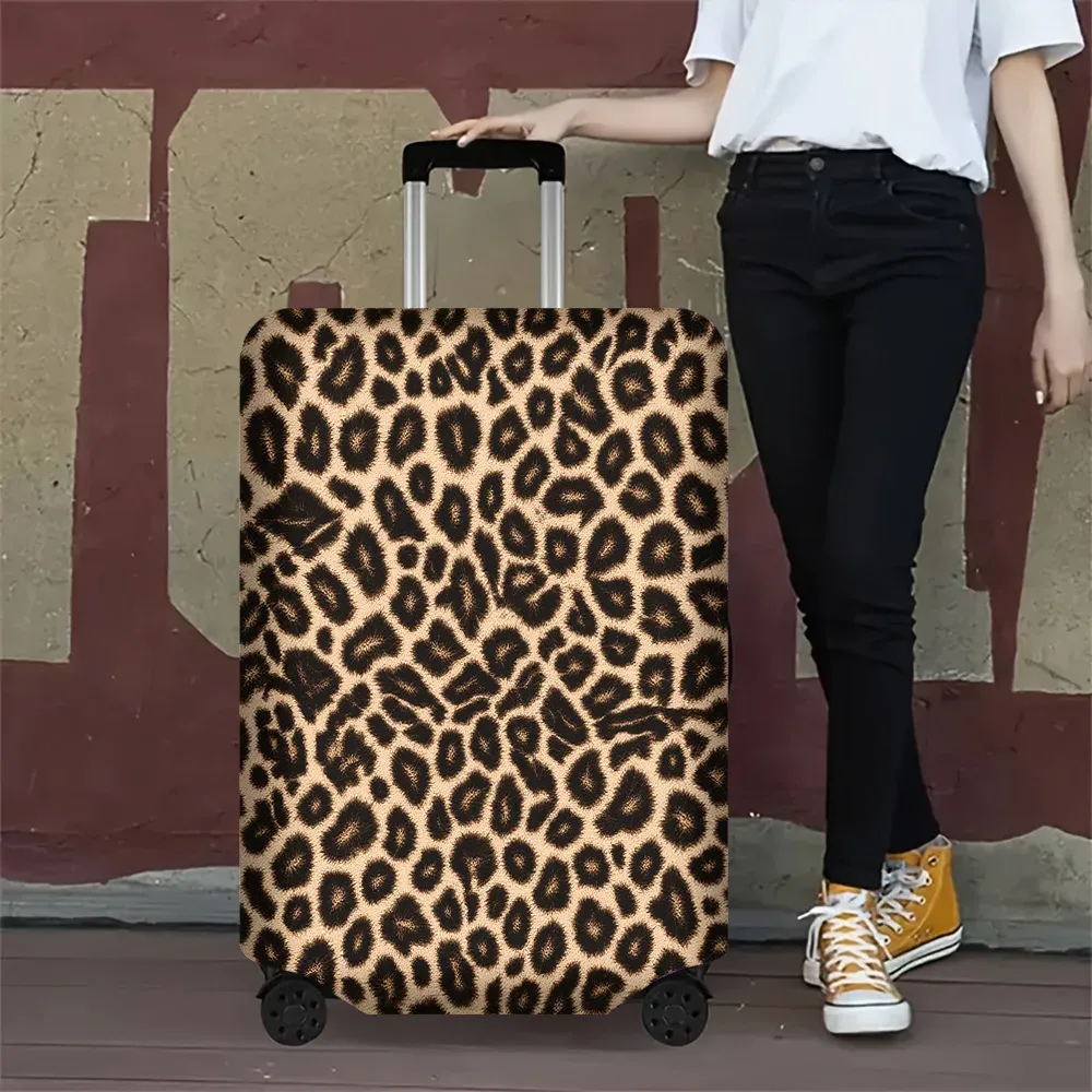 housse valise polyester motif léopard beige noir protection voyage accessoires voyage forme rectangulaire poignées latérales roulettes extérieures