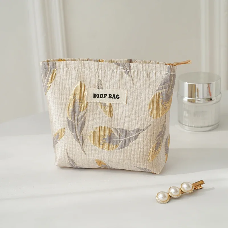 trousse polyester motif floral fleurs roses vertes fond blanc fermeture éclair voyage femmes cosmétiques maquillage sac rectangulaire