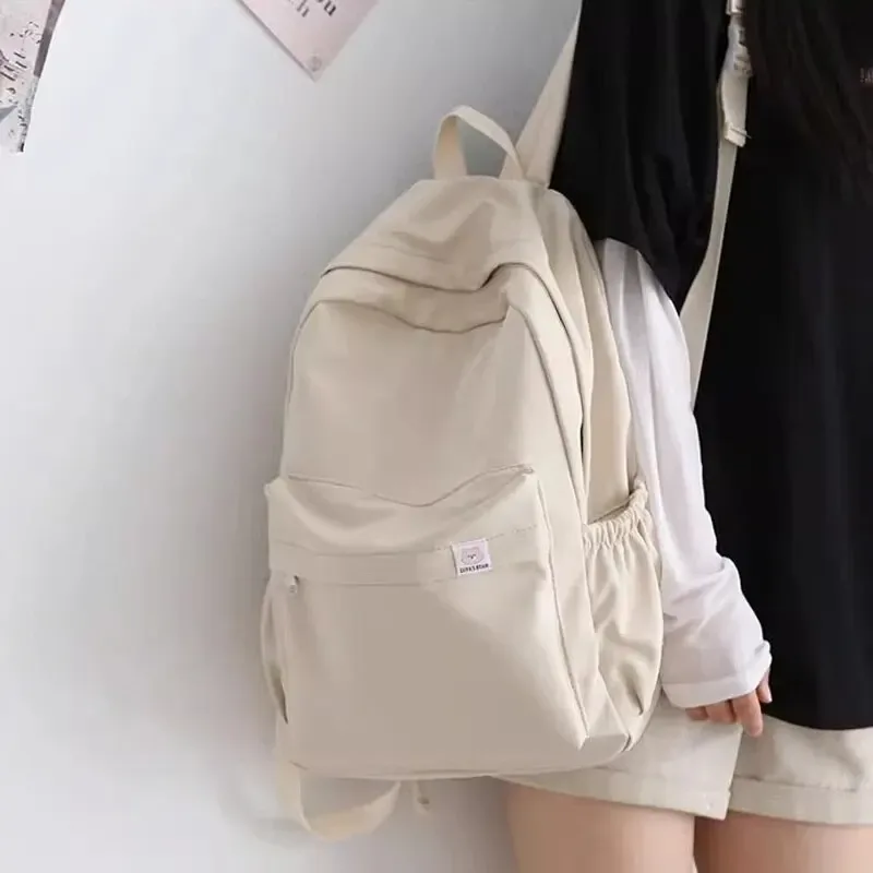 nouveau sac à dos imperméable en nylon pour femmes sac de voyage pour femmes sacs à dos cartable pour adolescentes couleur unie bookbag mochila bookbag
