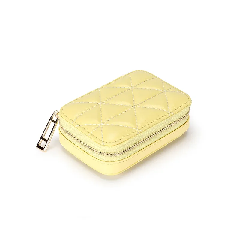 organisateur voyage cuir vache motif rayé blanc noir rose bleu carré zip décontracté cosmétiques maquillage