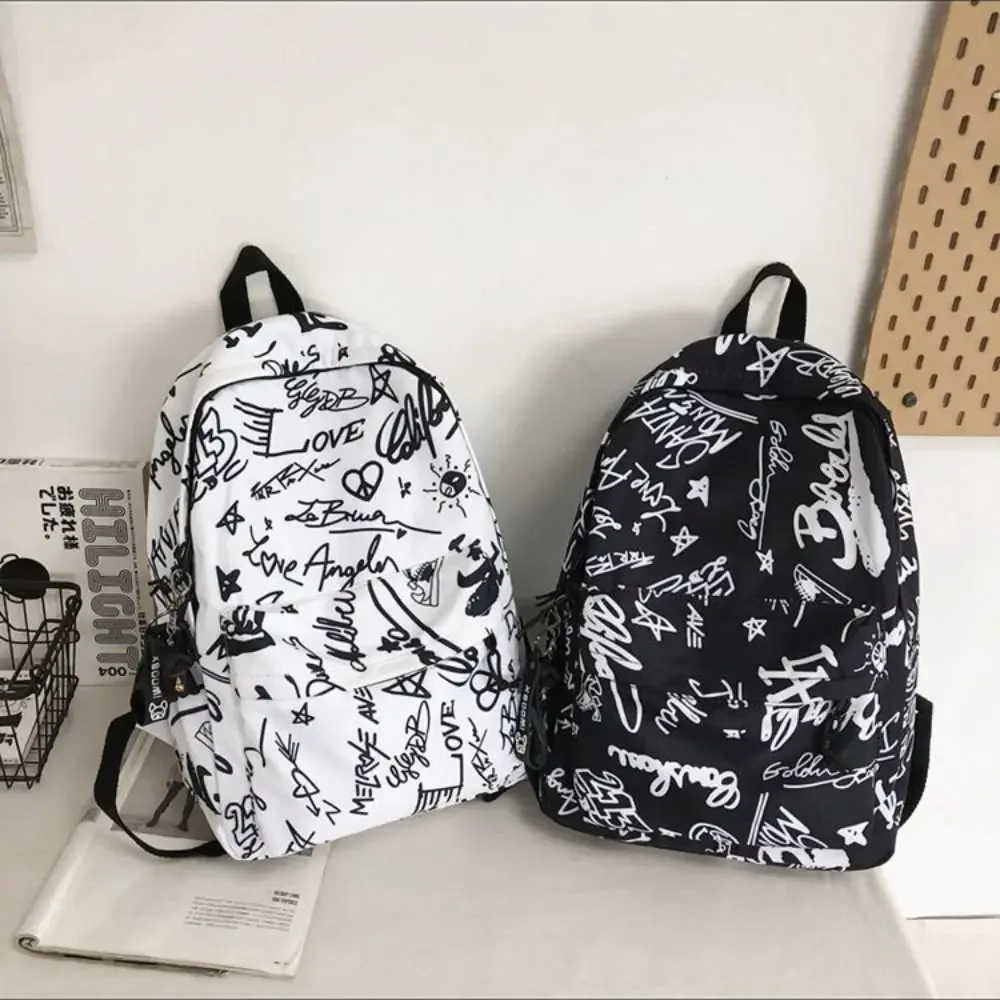 Nouveau Sac à Dos Grande Capacité Tendance Graffiti Style Coréen Ultra-léger pour l'école