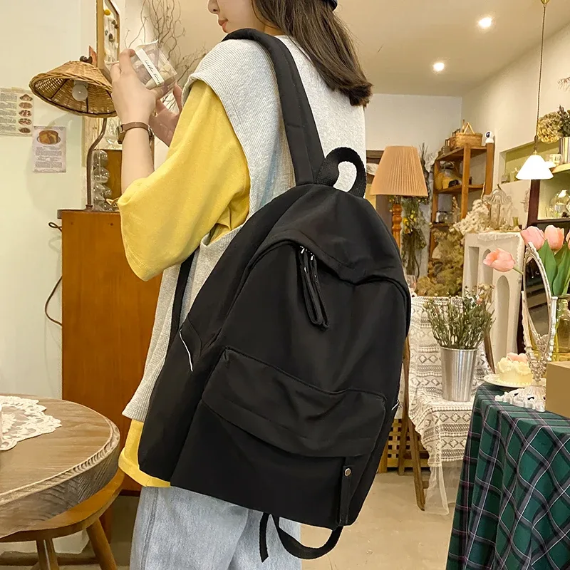 sac à dos simple de couleur unie pour femmes 2022 sacs d'école en nylon imperméable pour adolescentes sac à dos de voyage pour dames sac à bandoulière