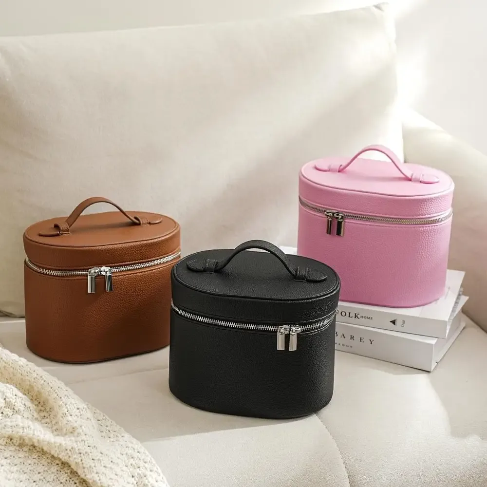 organisateur voyage polyester marron bleu noir texturé ovale compartiments poignée supérieure cosmétiques bijoux articles toilette